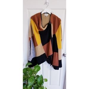 Neutral color block poncho